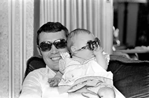 Boxer Alan Minter pictured at his Crawley Sussex home with his six month old baby