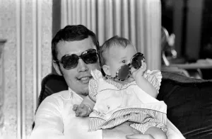 Boxer Alan Minter pictured at his Crawley Sussex home with his six month old baby