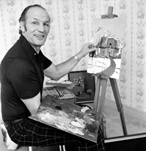 00058 Prints: Boxer: Boxing: Painting: Unusual: Henry Cooper working on a painting of a Cotswold