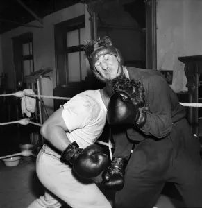 Boxer Don Cockell seen here Training in a Brighton Gym for his next fight his sparring