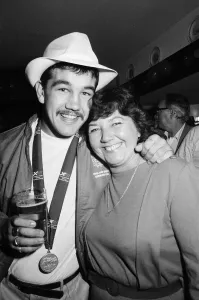 Boxer, Jimmy Moran celebrates his Commonwealth Games gold medal with friends at the Bell