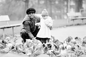 Boxer Kirkland Laing seen here with his child. 2nd December 1987