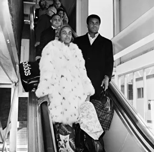Boxer Muhammad Ali and wife Belinda at Heathrow Airport en route to Beruit from New York
