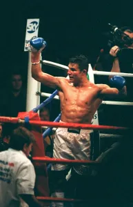 Boxer Robin Reid celebrates after defending his WBC super middle weight belt title Reid