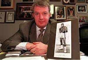 Promoter Prints: Boxing Promoter Tommy Gilmour December 1999 with a signed print of Mohammed Ali