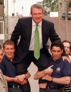 Boxing Promoter Tommy Gilmour lifted on the shoulders of Boxers Mark Breslin