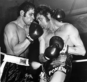 Boxing, punishing moment as Chris Finnegan (right) corners Eddie Avoth
