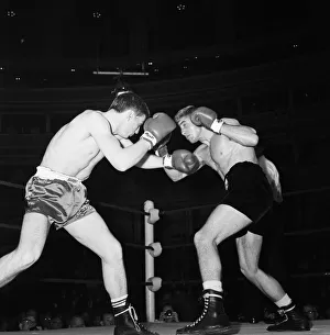 Boxing at The Royal Albert Hall. Liverpools Pat Dwyer (left) and Mark Rowe of London