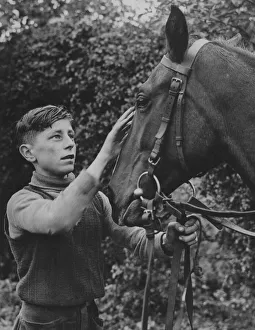 00053 Prints: Boy Jockey with a future. Young apprentice rider Denis Dillon