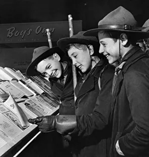 Boy Scouts Prints: Boy Scouts had a busmans holiday'reading pamphlets about the Scout