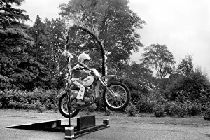 Boy Stunt Rider: 6 year old Darius Goodwin is pictured here leaping through flames for