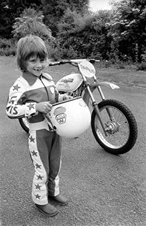 Stunts Prints: Boy Stunt Rider: 6 year old Darius Goodwin is pictured here prior to him leaping through