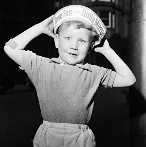Boy wearing Daily Mirror Hat, to promote Daily Mirror Day at Belle Vue