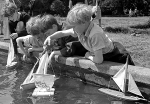 Four Boys enjoy a bit of model boat sailing during an open day at Bilton Grange boarding