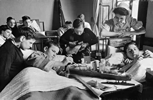 Nurse Prints: Boys make model ships from cardboard in a London hospital ward