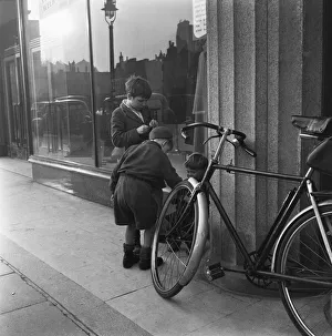 Boys outside a un-named clothing shop in the East End of London, 22nd February 1954