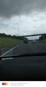 00731 Prints: BPM MEDIA This phallic-shaped cloud was spotted looming over the M42 on June 29