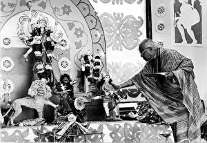 Worship Prints: Brahmin priest Mr R. P. Bannerjee at the alter of the goddess Durga during the most