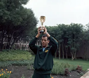 Brazil captain Carlos Alberto holds aloft the Jules Rimet World cup trophy following