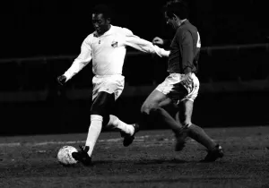 Brazilian football star Pele in action for Santos against Fulham March 1973