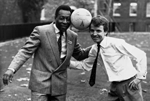 Former Brazilian football star Pele poses with Sports Minister Colin Moynihan MP while