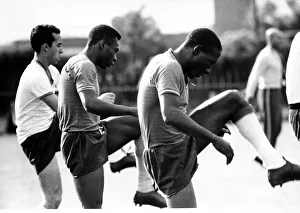 Stretching Prints: Brazilian football star Pele in a training session at Bolton during the 1966 World Cup