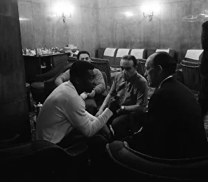 Brazilian footballer Pele in discussion with directors of Santos at the Grand Hotel