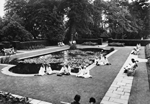 Sweets Prints: A break from work as Cadbury employees at Bournville rest up during the heatwave