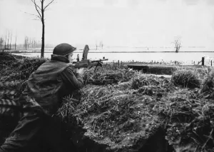 Holland Prints: A Bren gunner of the 15th Scottish Division 2nd Battalion Gordon Highlanders in one of