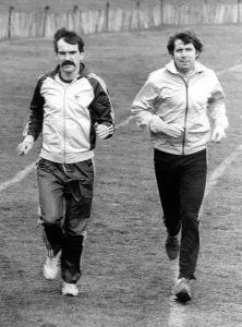 Brendan Foster (right) in a training run with Australian world corss country