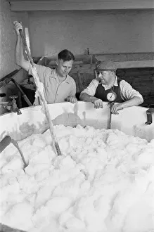 Brewing Prints: Brewer Claude Arkwell (left) seen here testing the Ale Fermenter at the Donnington