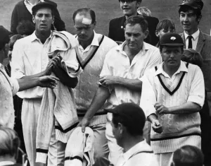 Brian Close walks in with Ray Illingworth (rolling shirt sleeve