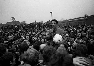00240 Prints: Brian Clough Ashbourne Race 1975 talking to crowd ball under arm February 1975
