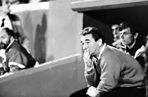 Brian Clough Football manager of Nottingham Forest FC sitting on team bench during match