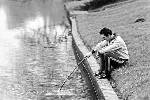 Suit Prints: Brian Clough Nottingham Forest manager sitting on the river bank thinking