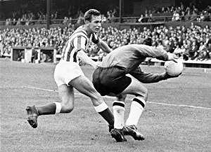 Brian Clough tackling goalkeeper during match-Sunderland verses Newcastle August