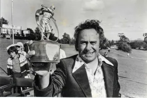00355 Prints: Brian Huggett showing his trophy off after that sudden death victory. 16th, August, 1978