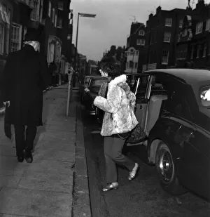 Dentist Prints: Brian Jones girlfriend accompanying him entering The Harley Street Nursing Home for
