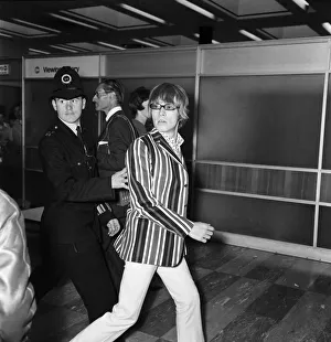 Two Men Only Prints: Brian Jones of The Rolling Stones at London Airport on 23 June 1966 en route for America