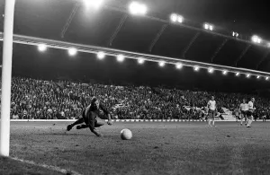 Arsenal Prints: Brian Kidd scores for Manchester United past Bob Wilson of Arsenal at Anfield
