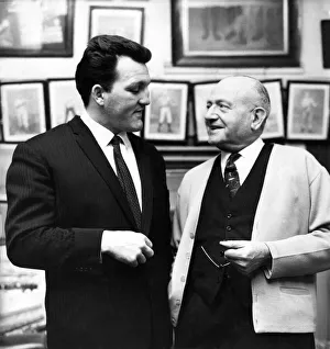 Brian London on left talking with Jack Solomons at Solomons Gym Windmill Street, London