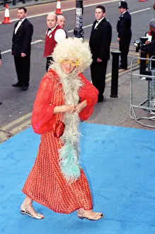 Queen Prints: Brian May arriving at Elton Johns 50th birthday party at Hammersmith Palais