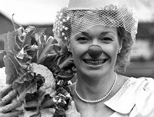 Bride Deborah Reed brings Comic Relief to holy matrimony with a red-nosed start to