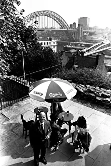 00498 Prints: The Bridge Hotel, Newcastle, manager Bert Young and customers admire the view of the Tyne