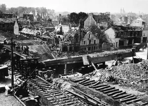 01438 Prints: Bridge re-building in Caen. Picture showing, right, the railway bridge blown by