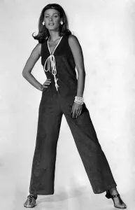 Bright blue towelling jumpsuit, trimmed with white at the V-neck