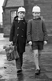 Bright Idea! Two Hamilton schoolboys seen here modelling the latest safety headwear