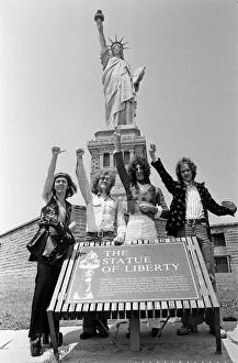One of Britains top pop groups Slade are pictured on their way to visit the Statue