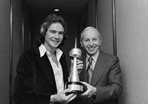 00964 Prints: Britains World Motorcycle racing Champion Barry Sheene receives his awards for