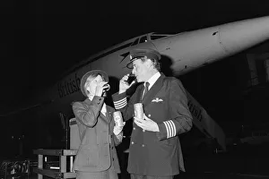 01305 Prints: British Airways Concorde stewardess Carol Bryant and Concorde captain John Cookdrink